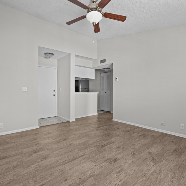 The Park at Veneto - Spacious Empty Room with Light Wood Flooring