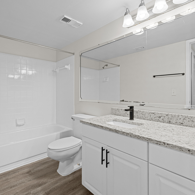 The Park at Veneto - Modern Bathroom Featuring a Granite Countertop