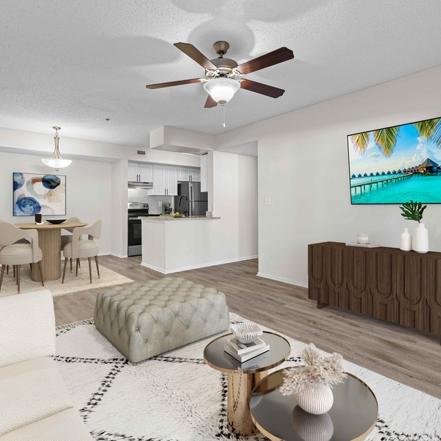 The Park at Veneto - Bright Living Room Featuring a Light Beige Sectional